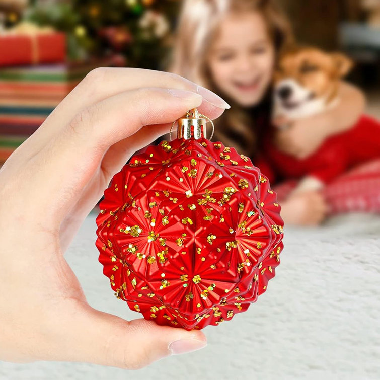Red plastic store ornament balls